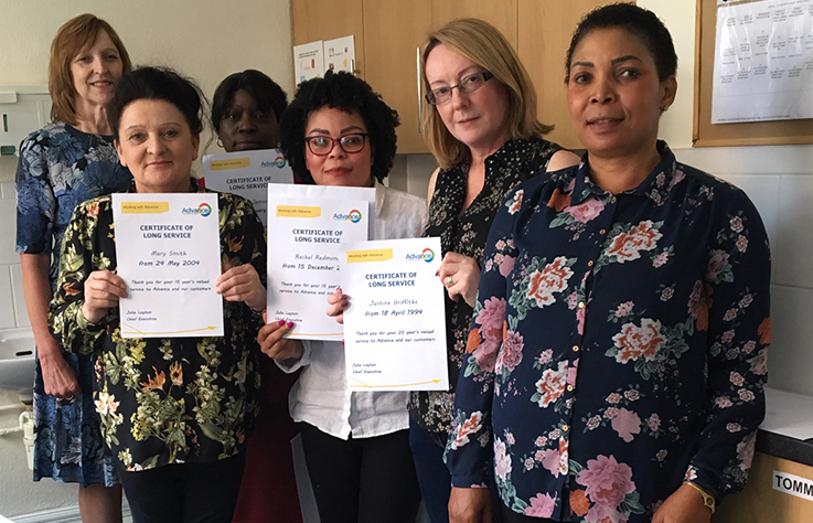 Luton team with their long service awards